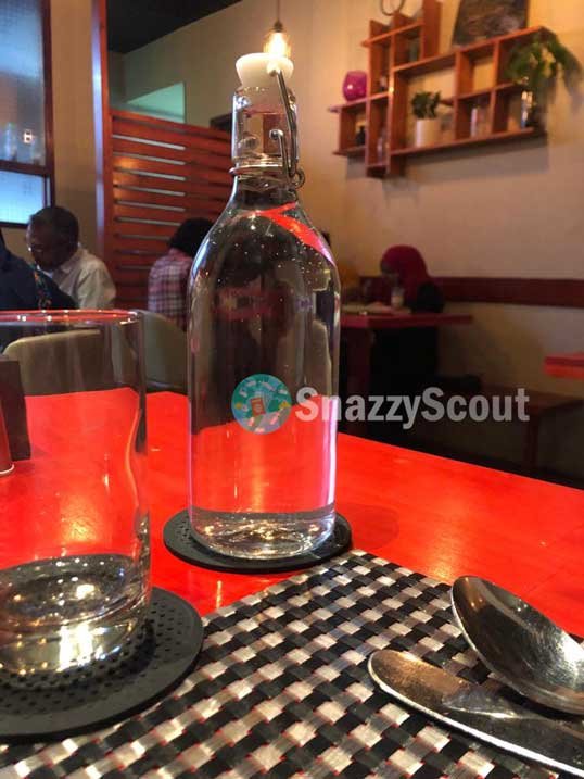 Glass water bottle served at PITA PAN